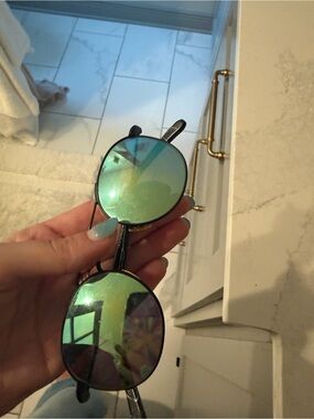 KREWE Orleans Round Sunglasses in Black with Blue Mirror Lenses
